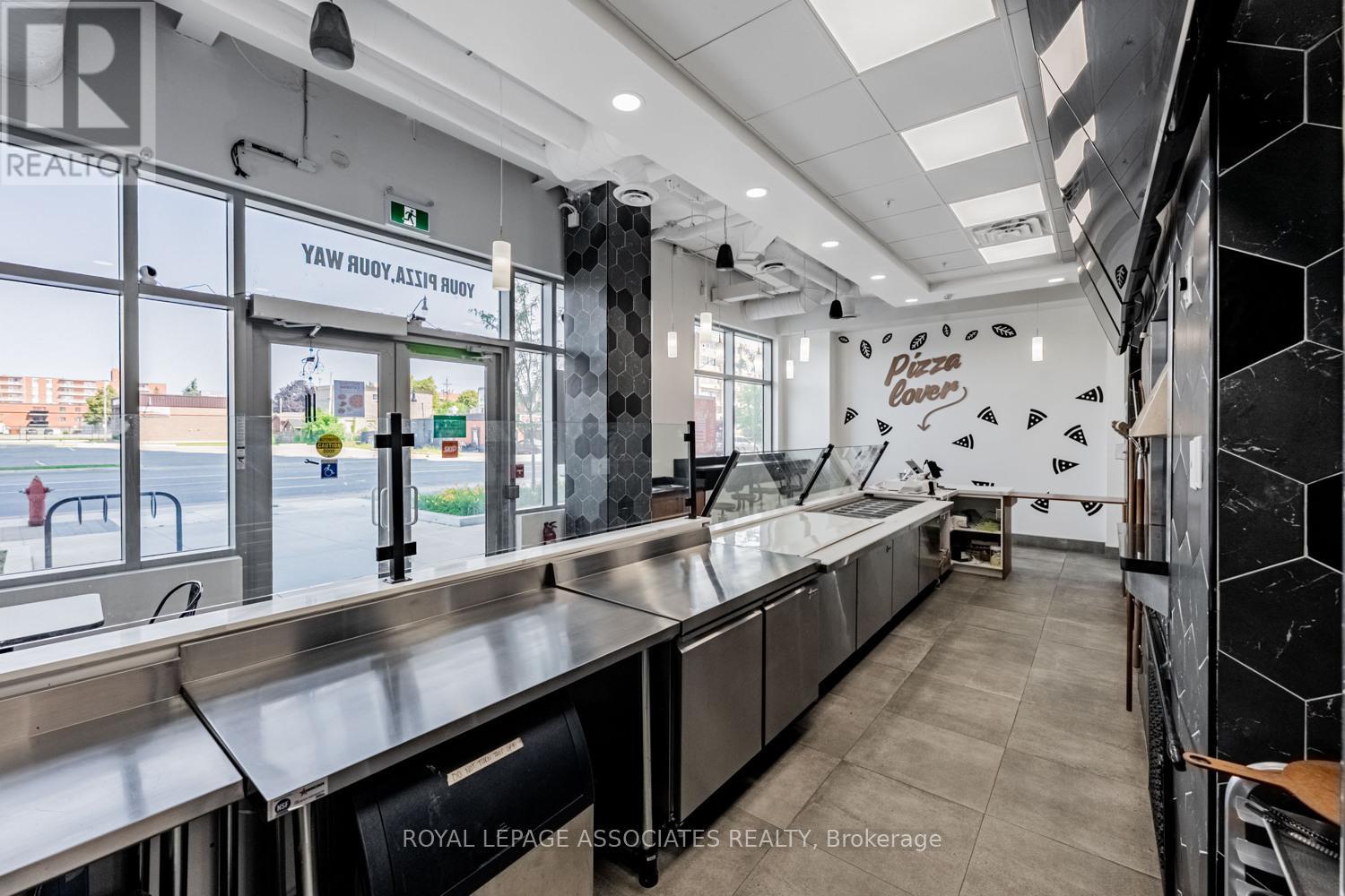 B – 205 QUEEN STREET E