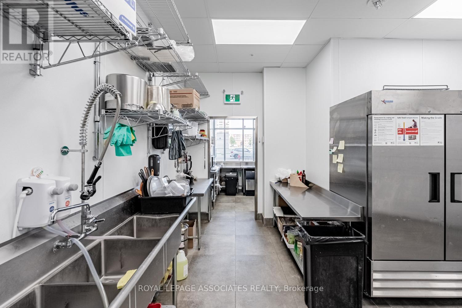 B – 205 QUEEN STREET E