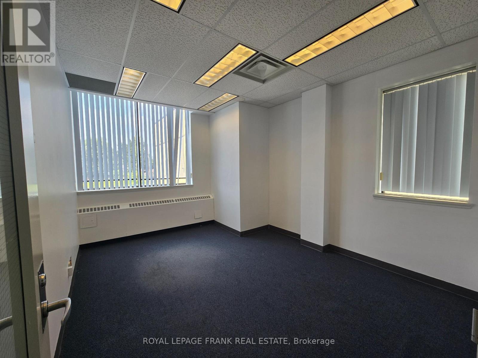 205 – 310 SIMCOE STREET S