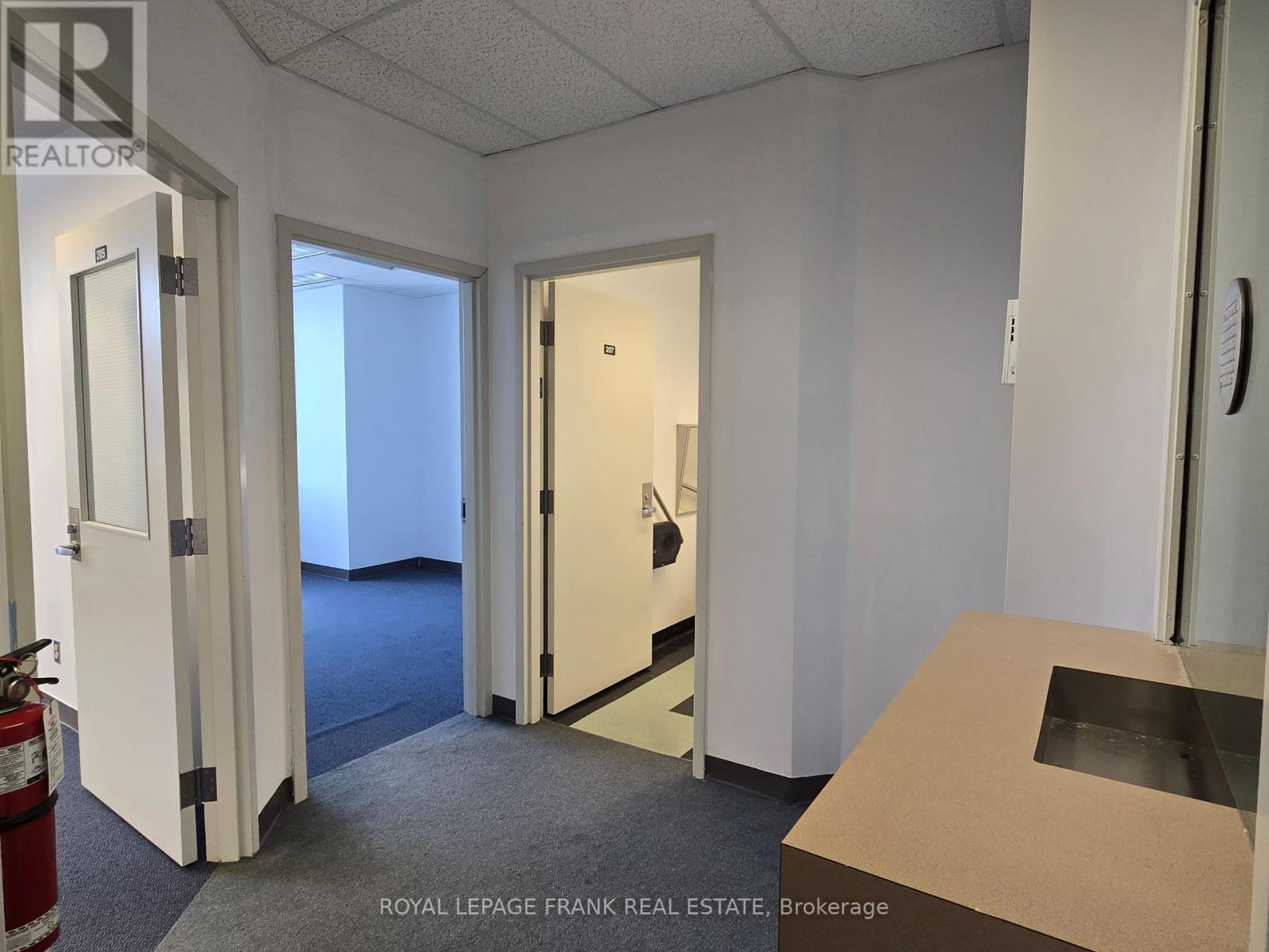 205 – 310 SIMCOE STREET S