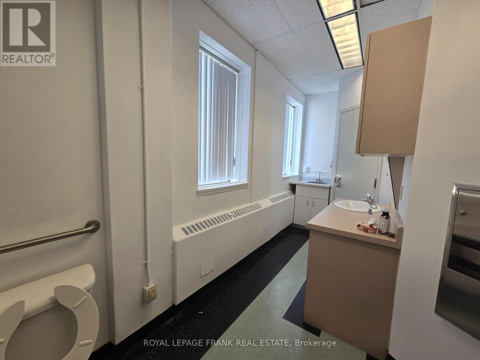 205 – 310 SIMCOE STREET S