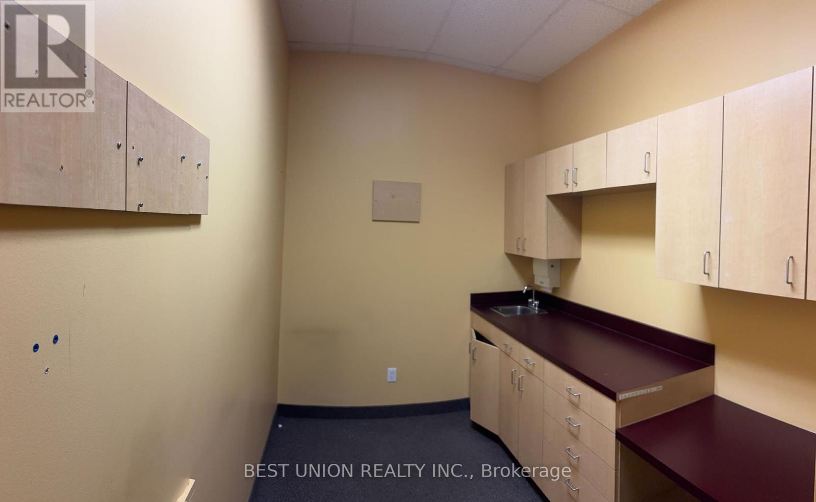 112 – 7155 WOODBINE AVENUE