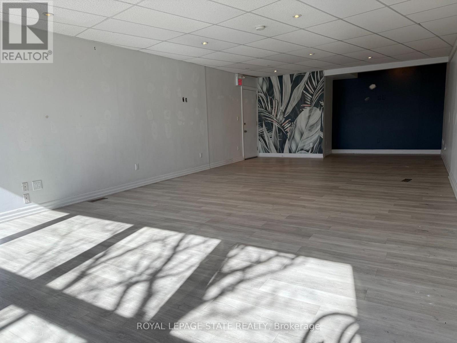 201 – 1036 KING STREET W