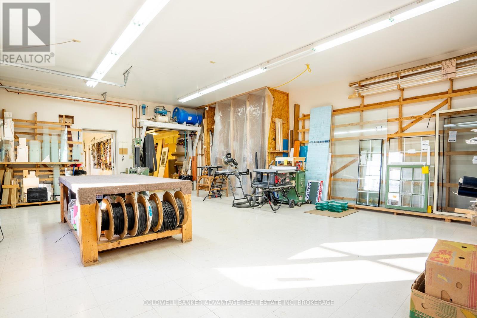 0 “THE GLASS COMPANY”