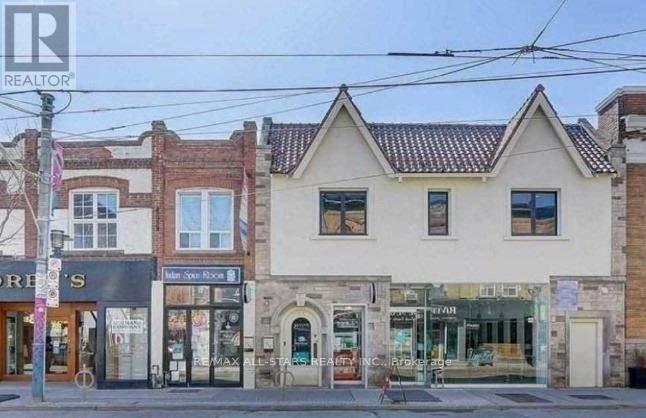 202A – 717 QUEEN STREET E