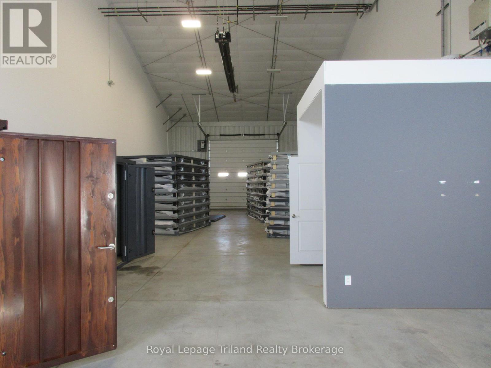 4 – 1099 COMMERCE WAY