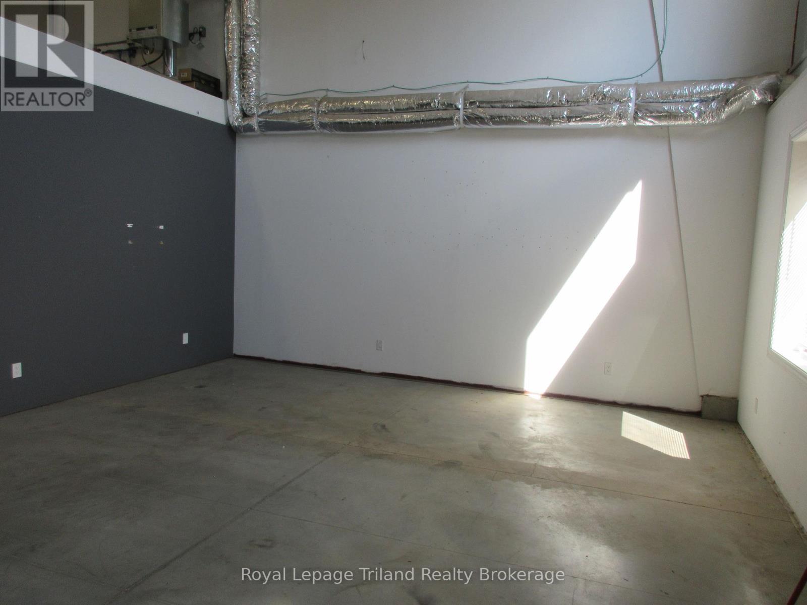 4 – 1099 COMMERCE WAY