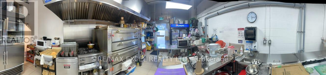 1FC15 – 9390 WOODBINE AVENUE